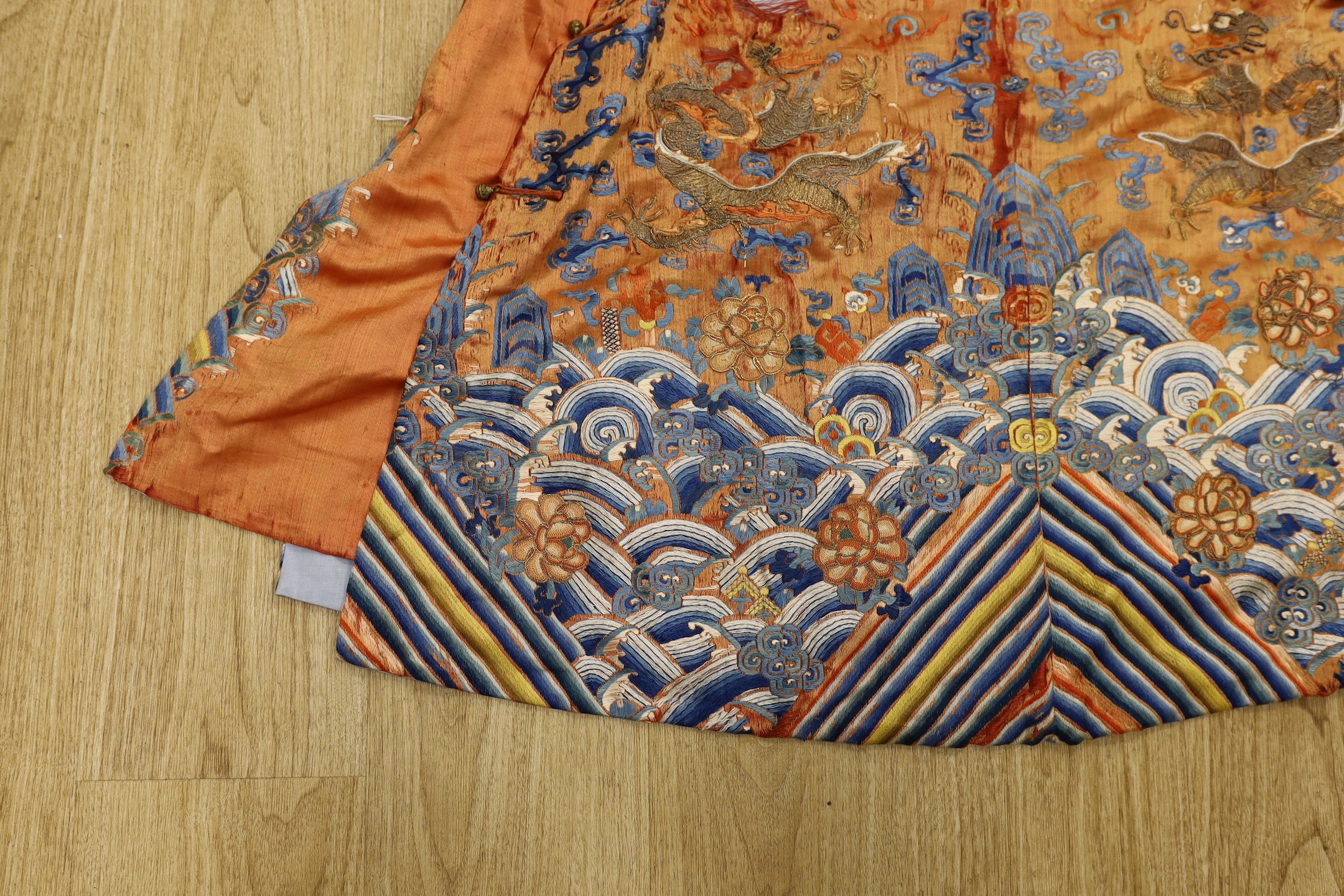 A Chinese embroidered silk dragon robe, late Qing Dynasty